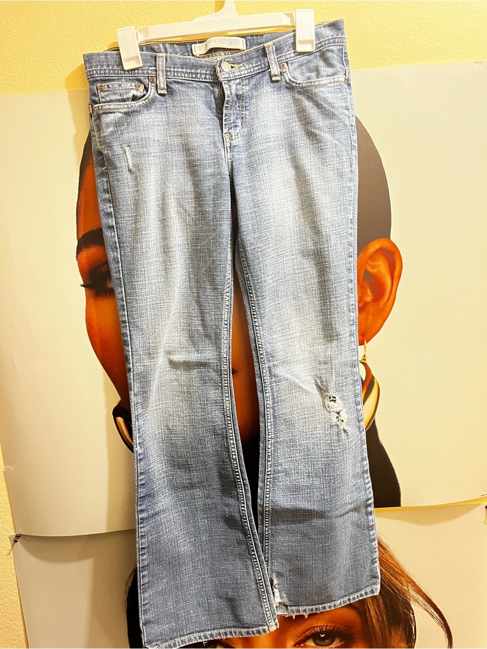 Express Light Blue Flare Jeans with Subtle Distress